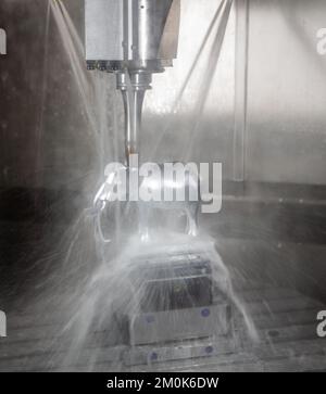 High precision CNC milling machine cutting an elephant workpiece. Industrial manufacture. Stock Photo