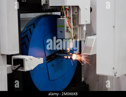 Pipe laser cutting machine. Industrial manufacture. Stock Photo