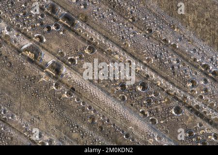 close up Steam and water droplets in plastic wrap, Reinforced concrete piles of the new building with clear plastic wrap for keeping the moisture in p Stock Photo