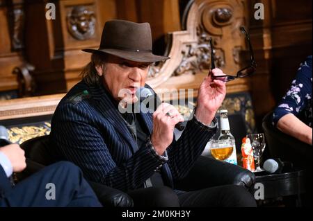 Hamburg, Germany. 06th Dec, 2022. Rock singer Udo Lindenberg on stage in the Great Festival Hall. At the invitation of the Übersee-Club, four honorary citizens of the city come together to talk about the future of Hamburg. Credit: Jonas Walzberg/dpa/Alamy Live News Stock Photo