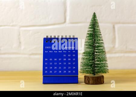The calendar for December 2022 is on the table Stock Photo