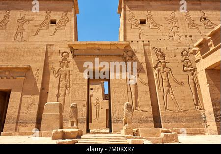 The entrance of the Philae temple complex against the blue sky in Egypt Stock Photo