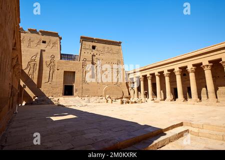 A scenic shot of the Philae temple complex against the blue sky in Egypt Stock Photo