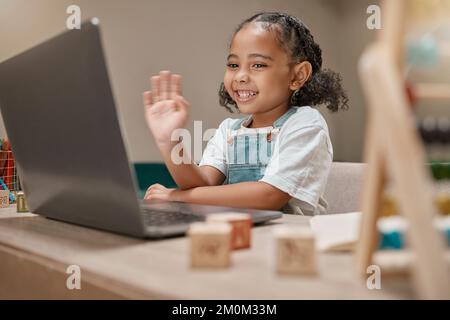 Child, waving or laptop video call for homeschool education, e learning support or lockdown class in house or home living room. Smile, happy or Stock Photo