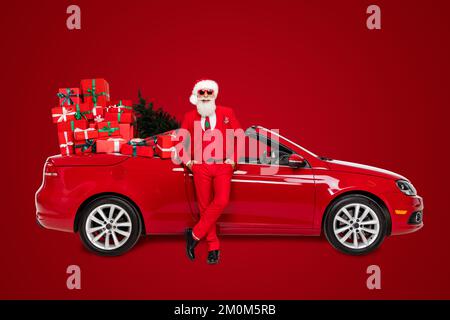 Photo of santa claus old grandpa hands pockets loaded car present delivery concept isolated on white color background Stock Photo