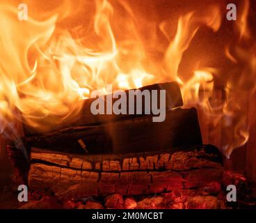 Fire flames and burning wood logs, fireplace close up, Warm home in winter, front view Stock Photo