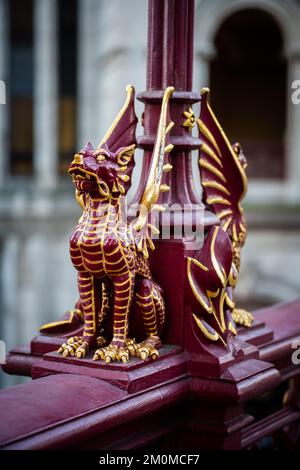 Dragon on Holborn Viaduct in the City of London with Goldman Sachs