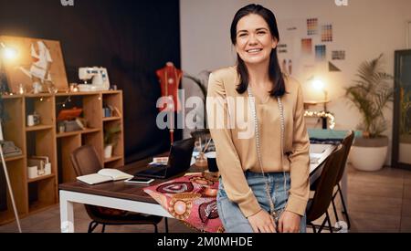 Portrait, fashion and designer in workspace, woman and with smile. Young female, tailor and creative entrepreneur, prepare for runway show, relax and Stock Photo