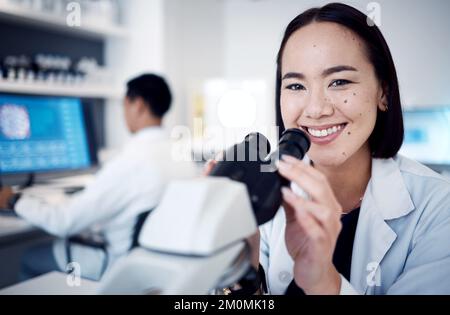 Laboratory scientist, face or microscope in medical research, healthcare medicine study or Japanese medical pharmacy. Portrait, smile or happy asian Stock Photo