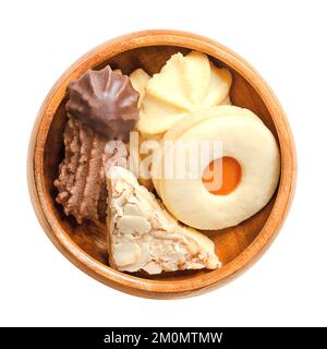 Variety of Christmas cookies, Christmas biscuits in a wooden bowl. Traditional butter cookies in different shapes. Stock Photo