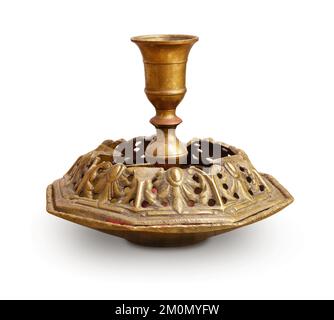 Front view of empty old brass candlestick isolated on white Stock Photo