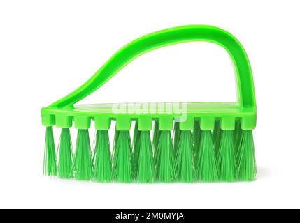 Side view of green plastic clothes brush isolated on white Stock Photo
