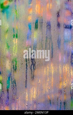 Abstract patterns of condensation on window. Stock Photo