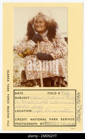 Elderly Eskimo lady in traditional wolverine parka ruff. Alaska Task Force Photographs Stock Photo