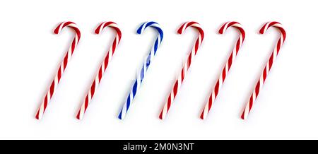 Red and blue Christmas candy canes isolated on white background Stock Photo
