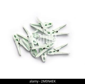 Heap of clothespins isolated on white background Stock Photo