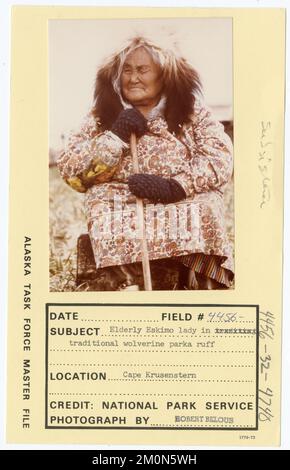 Elderly Eskimo lady in traditional wolverine parka ruff. Alaska Task Force Photographs Stock Photo