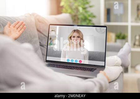 Pleasant talk using laptop Stock Photo