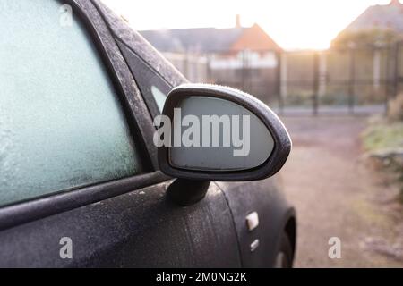 ice crystals formed up on a car wing mirror, freezing conditions Stock Photo