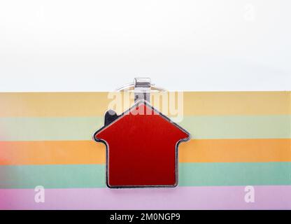 Real estate concept with a house icon on colorful background Stock Photo