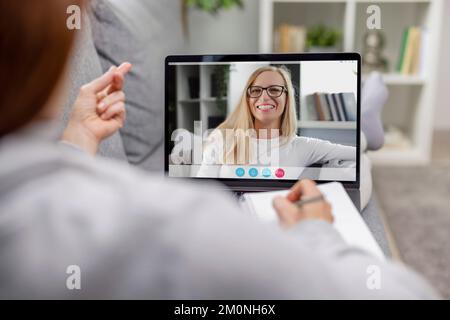 Pleasant talk using laptop Stock Photo
