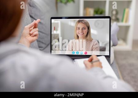 Pleasant talk using laptop Stock Photo
