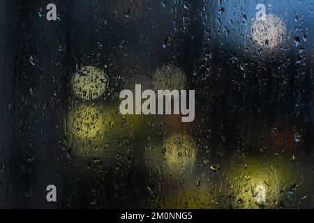 Raindrops falling on the window Stock Photo