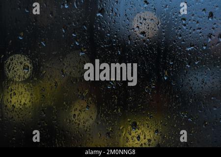 Raindrops falling on the window Stock Photo