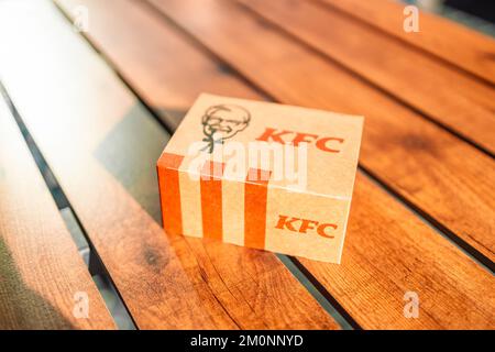 Krakow, Poland - September 11 2022: Box of KFC Fried Chicken and Chili and Ketchup Sauce Stock Photo
