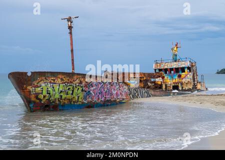 Remains of a cargo ship aground on Manzanillo beach on the Caribbean coast of Costa Rica Stock Photo