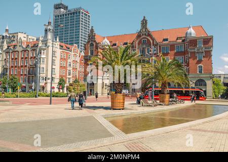 KATOWICE, POLAND - MAY 31, 2022: People relaxing on the square in the city centre of Katowice, Poland Stock Photo