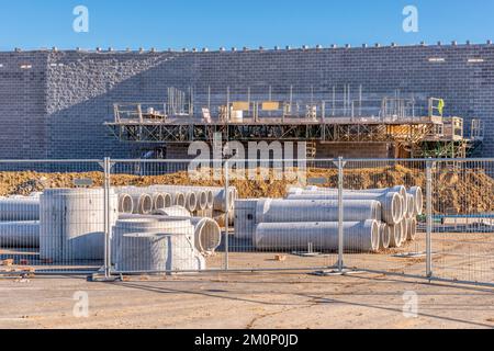 Horizontal shot of a security fence around a commercial retail construction site Stock Photo