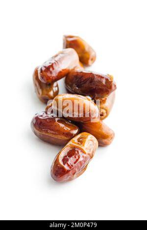 Dried dates fruit isolated on the white background. Stock Photo
