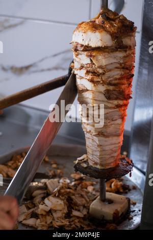 Shawarma. Closeup picture of stacked meat roasting, shawarma. Food in Turkeye Stock Photo