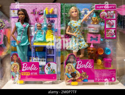 Barbie dolls on the store shelf. Barbie is a fashion doll manufactured by the American toy company Mattel, Inc. and launched in March 1959. Stock Photo