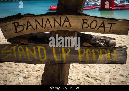 Sign for a Banana Boat on a wooden surface Stock Photo