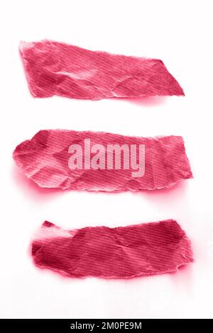 Recycled paper craft stick on white background. Viva magenta Stock Photo
