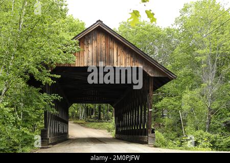 Located in Andover, NH, it carries Bridge ST over The Blackwater River.Built in 1882 and built of town truss design and construction. Located in a qui Stock Photo