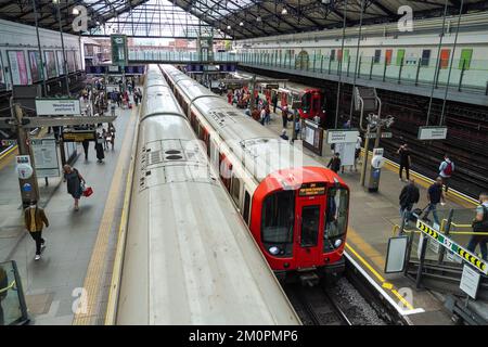 Passengers on platform at Earl's Court underground, tube station London England United Kingdom UK Stock Photo