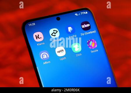 Buy Now Pay Later apps Klarna, Afterpay, Affirm, Uplift, Sezzle, Zilch, and PayPal pay in 4 on a smartphone. Point-of-sale loans. Stock Photo