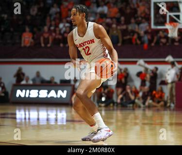 Dayton Forward Zimi Nwokeji (12) And Robert Morris Forward Stephaun ...