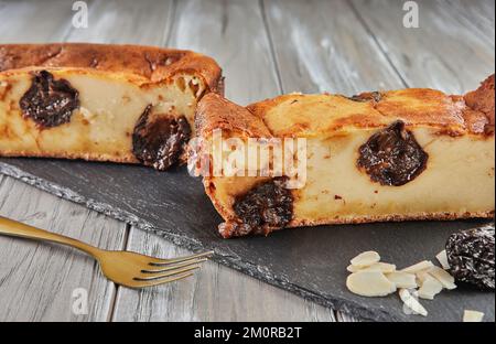 Plum pie baked in the oven on stone stand. Stock Photo