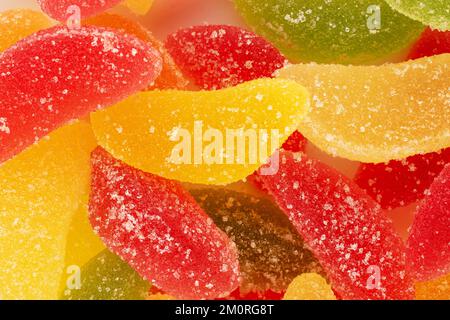Several sweet marmalade candies, macro, top view. Stock Photo