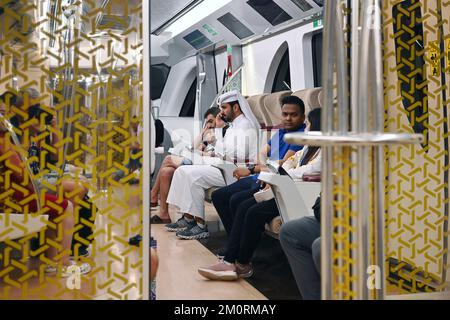 Impressions from Doha/Qatar on December 7th, 2022. Metro, Qatari family sits in a carriage in 1st class, Gold Club Class, subway, underground Football World Cup 2022 in Qatar from 20.11. - 18.12.2022 ? Stock Photo