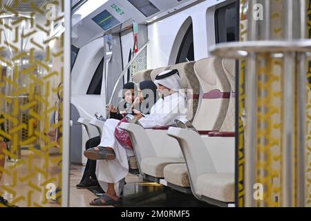 Impressions from Doha/Qatar on December 7th, 2022. Metro, Qatari family sits in a carriage in 1st class, Gold Club Class, subway, underground Football World Cup 2022 in Qatar from 20.11. - 18.12.2022 ? Stock Photo