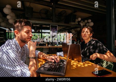 A young talented  business people are tired after they tried to solve the problem about the project but the didn't make it Stock Photo