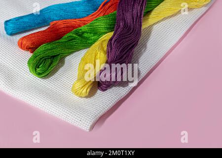 Cotton threads for sewing. Multicolored palette, handmade process. copy space Stock Photo