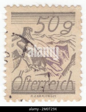 AUSTRIA - 1925: Original canceled Austrian 50 groschen postage stamp in grey with White-Shouldered Eagle on mountine top Stock Photo