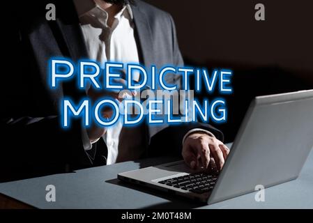Hand writing sign Predictive Modeling. Business concept maintenance strategy driven by predictive analytics Stock Photo