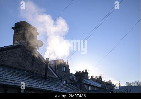 Kendal, Cumbria 8th December 2022. Freezing temperatures of -4 degrees Celsius hit Kendal in Cumbria overnight, causing a harsh frost over the historic town. Car windscreens were covered in ice, steam rose above frozen rooftops and parkland was frozen over after the ‘Troll of Trondheim’ hit many parts of the UK. Credit: Stop Press Media / Alamy Live News Stock Photo